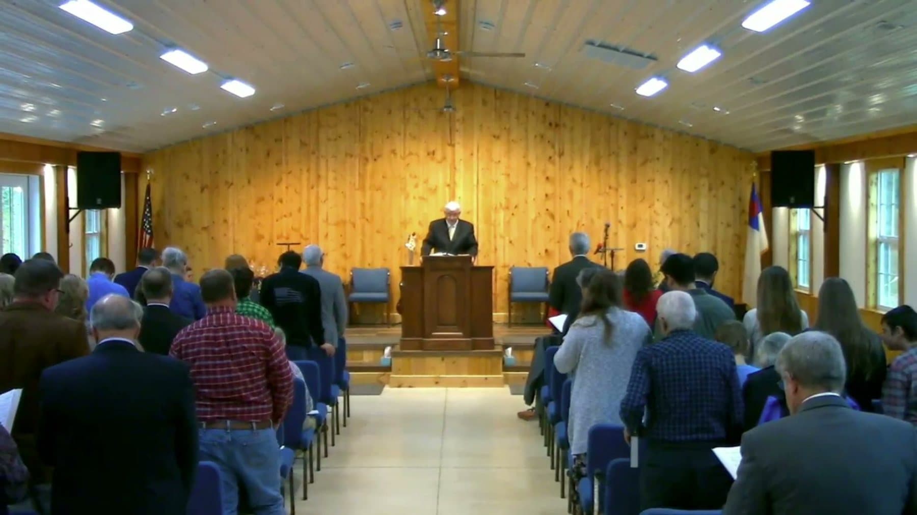 The congregation of Calvary Baptist Church standing to sing during a Sunday morning service