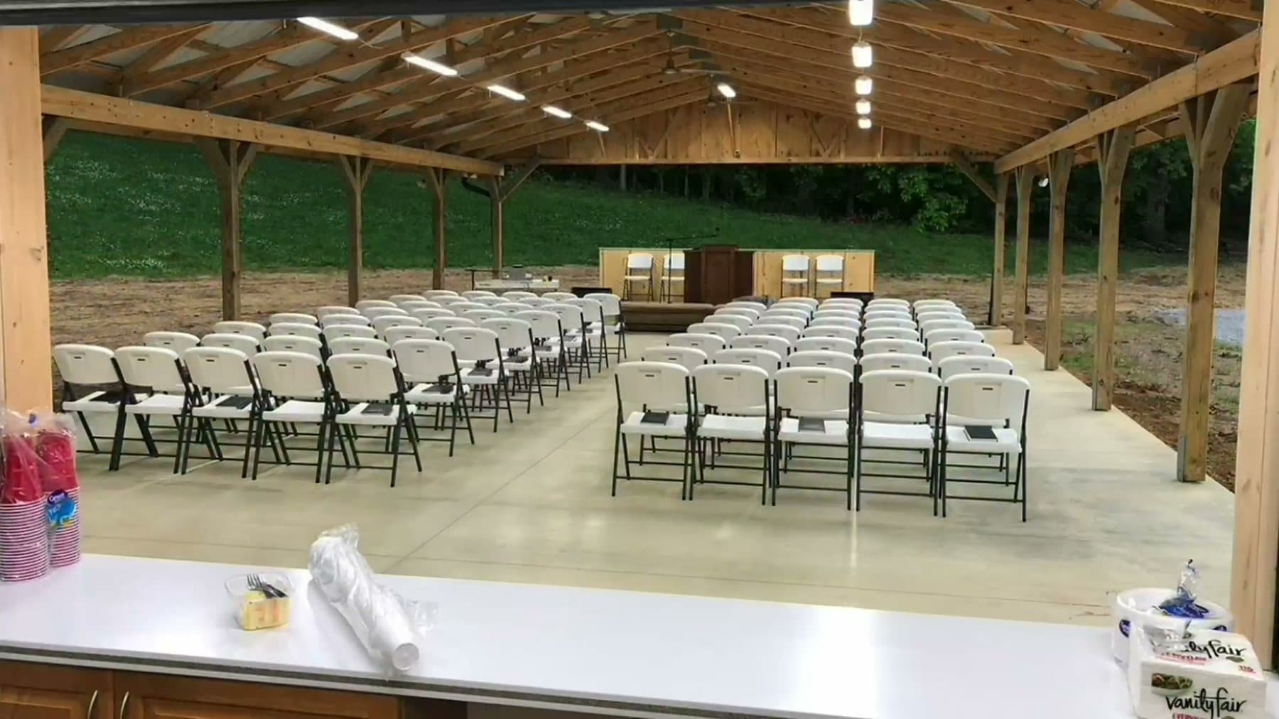 The pavilion at 610 Myers Lane set with chairs for a gathering